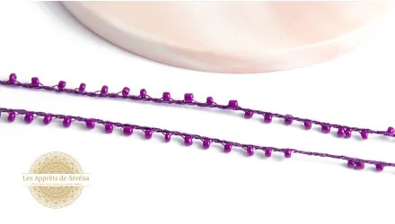 Fil coton perlé de rocailles violettes 2mm